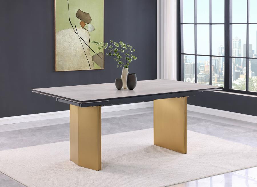 This modern dining table showcases a stunning beige glass top with a 3D-printed design, supported by a brushed gold stainless steel base for a sophisticated and luxurious look. Perfect for hosting, the table features two 12-inch refractory extension leave
