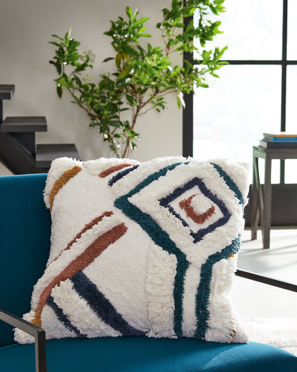 An artisanal take on textural interest, this pillow marries earthy tones with whimsical design. The abstract accent is right at home in boho-chic and casually cozy spaces.<br/><br/><b>Product Features</b><ul><li>Made of cotton</li><li>Soft polyfill</li><l