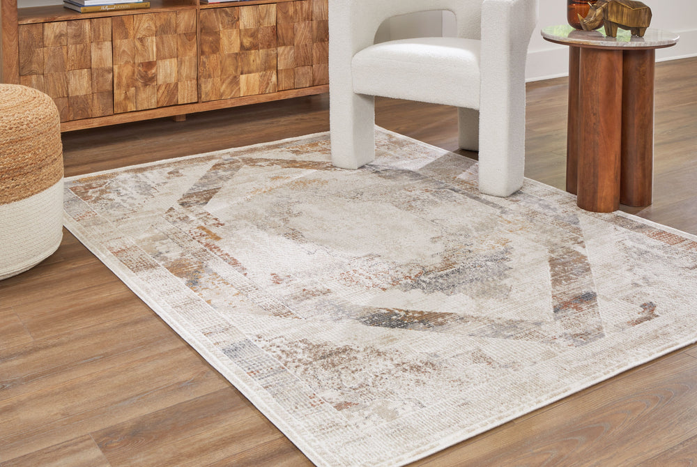 An updated interpretation of the classic medallion design, this casual area rug delights with its fresh feel and timeless appeal. Ultra-neutral hues in slightly muted tones give it a down-to-earth practicality that complements so many settings and color s