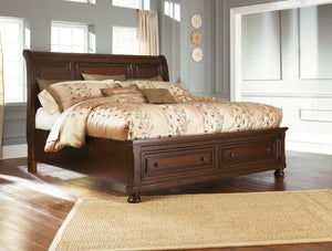 Those drawn to the warm, rustic feel of vintage-inspired interiors love how this California king sleigh storage bed suits their style. Rustic finish is rich with character, while beveled panel framing and turned bun feet reflect beauty in the details. Two