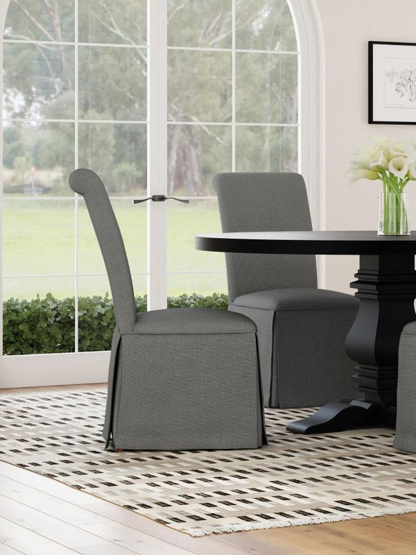  somewhat formal spin on your dining room decor with a set of two classic parson chairs. Each features a tall back with an armless profile for impeccable comfort and elegance. The chair features plush foam padding