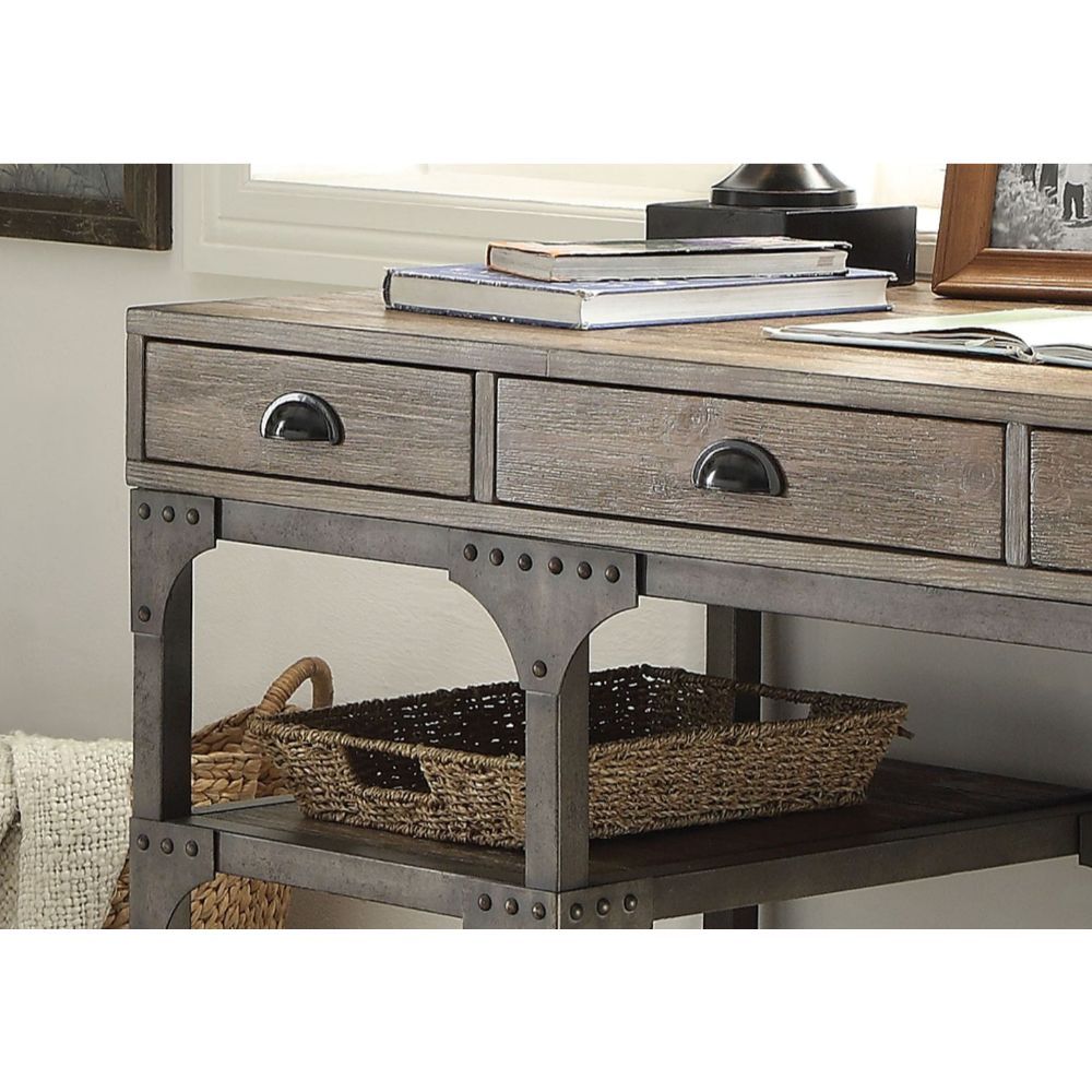 The Gorden Desk versatility and style will blend masterfully in your home office. The storage feature includes three top drawers and two shelves to keep organized your office supplies. Carefully constructed from selected wood and veneers in Weathered Oak 