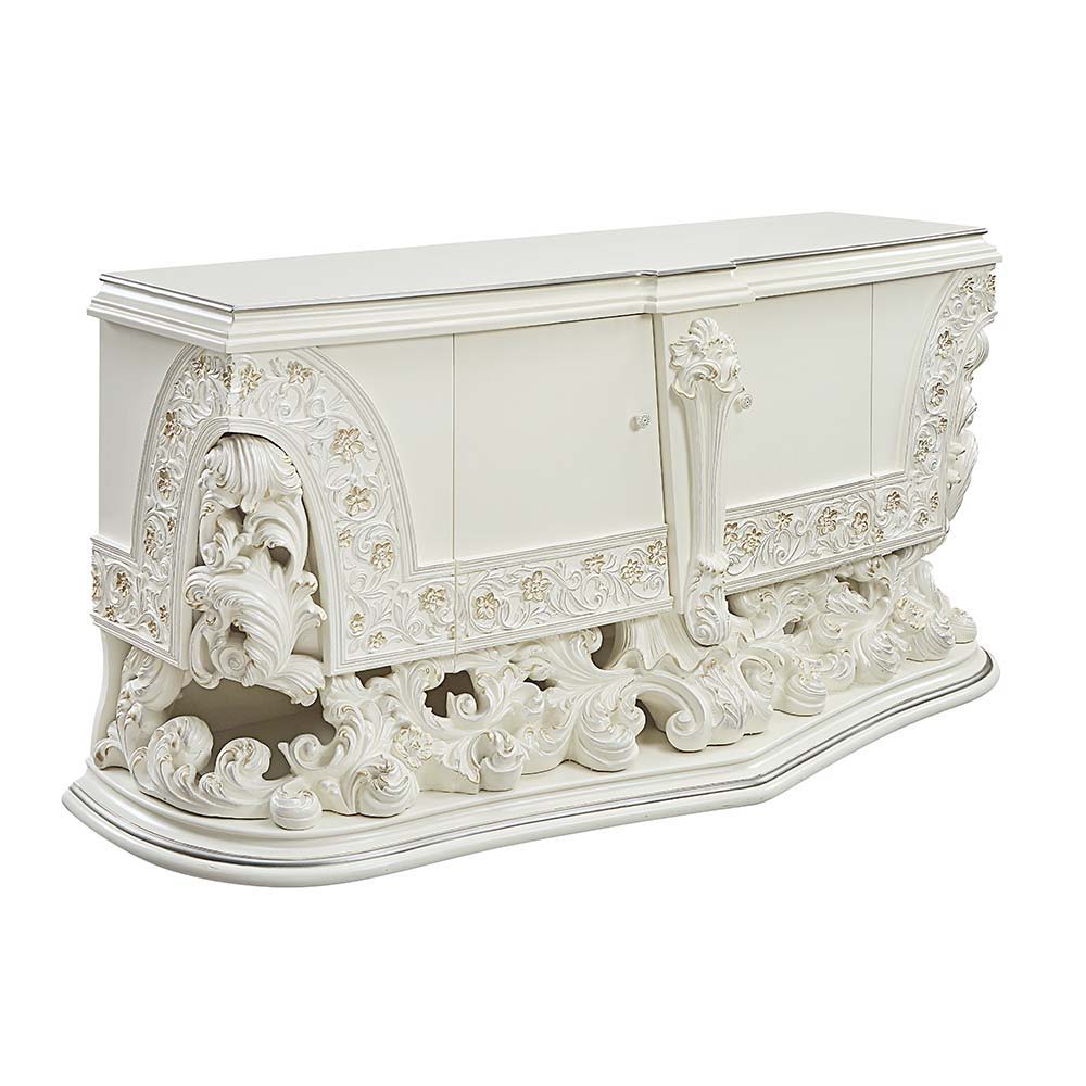 Exuding elegance and refinement, the Adara dining table is designed after the elaborate Rococo style. The single pedestal base is elaborate and commands the attention of everyone. Leave guests stunned with its beauty. Floral and leaf motives make up the c