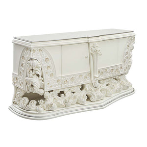 Exuding elegance and refinement, the Adara dining table is designed after the elaborate Rococo style. The single pedestal base is elaborate and commands the attention of everyone. Leave guests stunned with its beauty. Floral and leaf motives make up the c