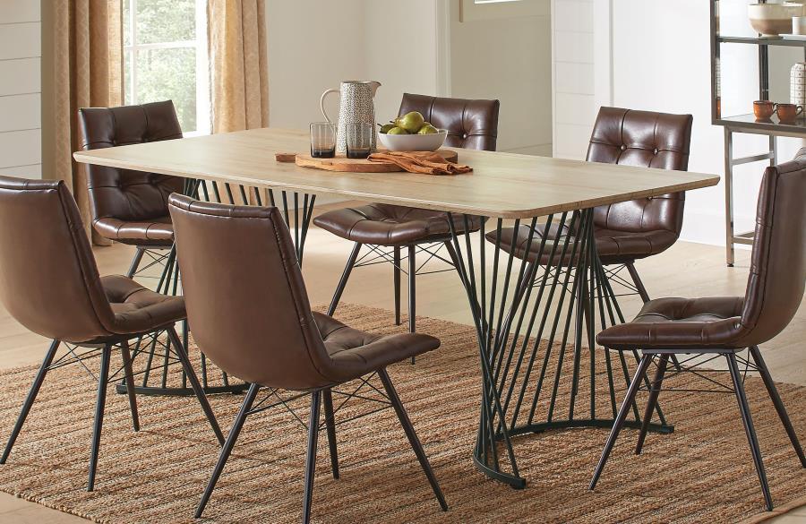 Make a statement in your dining room with this sculptural rectangular table, combining rustic charm and industrial flair. Featuring a natural oak grain top with a durable, easy-care laminate veneer, it sits on bold dual pedestal bases crafted from twisted
