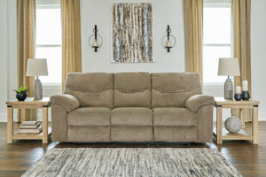  this reclining sofa invites a relaxed sensibility into your space. Its beige upholstery has a universal appeal