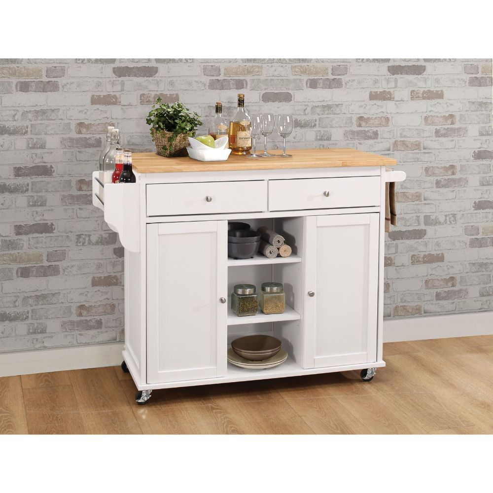 Add storage space and charm to your kitchen with this Tullarick wheeled kitchen island. The stylish white finish and natural wood top along with silver handles and pulls make this cart an adorable addition to cottage, contemporary or beach decor schemes. 