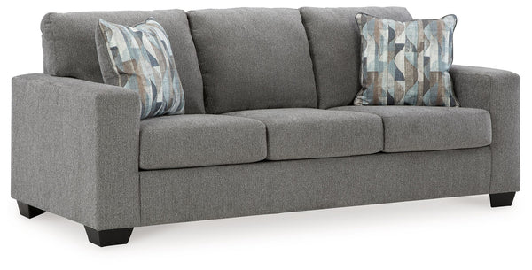  and the wide track arms are eager to support your quest for total relaxation. Distressed abstract toss pillows bring a fresh breath of contempor