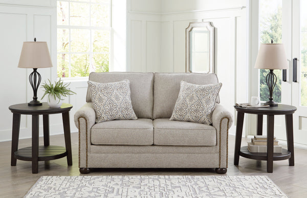  this loveseat complements your transitional seating area. Its versatile upholstery is delightfully detailed for a subtle herringbone effect. Designer touches like decorative nailhead trim and bun legs