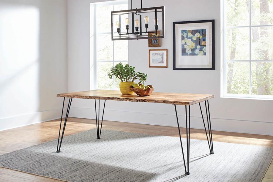 An interesting take on industrial modern design, this rectangular dining table is full of bold visuals. Constructed of wood, the table top showcases a distressed natural acacia finish that reveals the wood grain. Dark hues are exposed along the sides of t