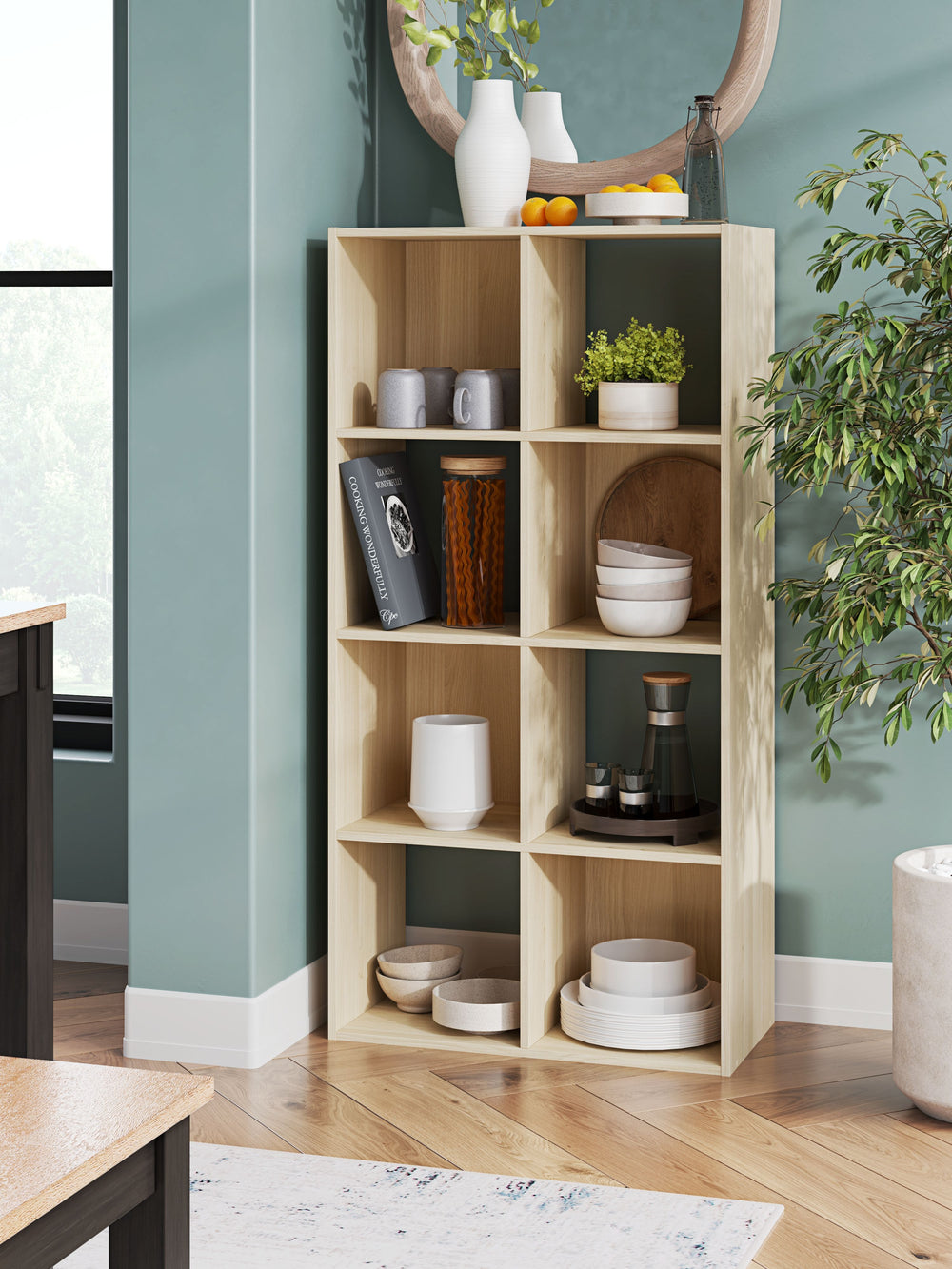 Keep clutter out from underfoot with this eight-cube organizer. The natural finish over replicated ash wood grain is warm and inviting, all while keeping your toys, knickknacks and other items stored away. The perfect marriage of style and function, this 