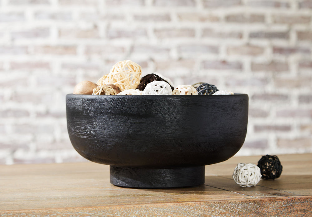 Elevate your tablescape with this bowl. Utterly contemporary in a black finish, it acts as a functional addition to dinner parties as you showcase and serve culinary creations. Or keep it as a decorative piece for coffee table displaysâ€”itâ€™s stunningly