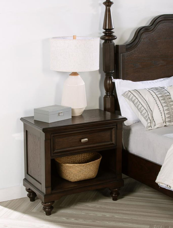  making it a perfect addition to any traditional bedroom. The dark oak finish enhances the intricate wood grain