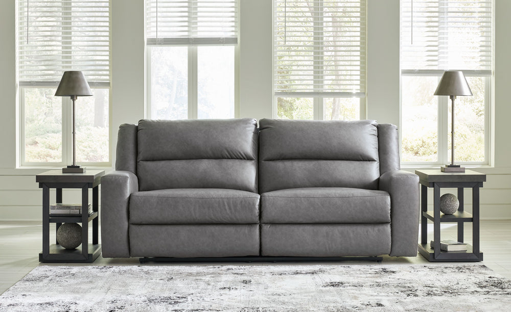 This reclining sofa and loveseat set appeals to your love for feature-filled furniture, all while maintaining a clean-lined and contemporary design. Pop-out storage and cup holders keep essentials close when you need them and tuck away easily when you don