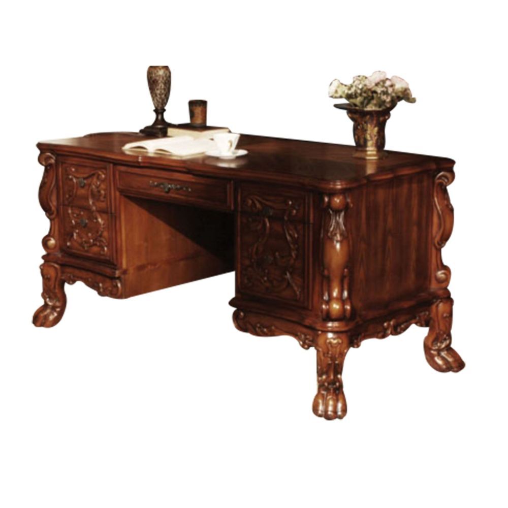 The Dresden executive desk classic style will blend masterfully in your home. Carefully constructed from selected wood and veneers in rich Cherry Oak Finish. Highly decorative details, oversized crown, claw feet and decorative scrolled moldings give this 