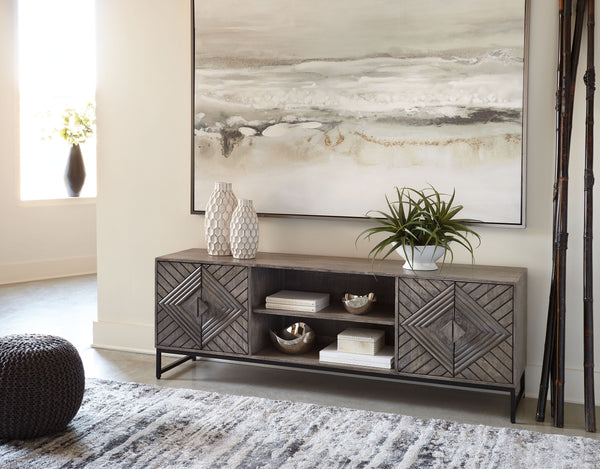  this accent cabinet beautifully complements your desired aesthetic. The classic charm of a distressed gray finish meets chic metropolitan styling