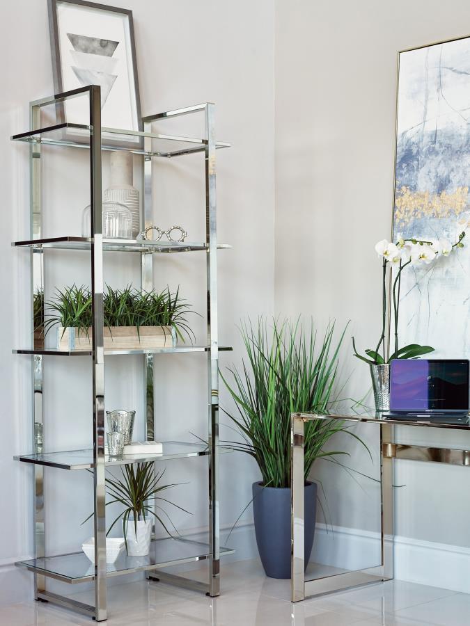 Create a well styled living space that radiates modern luxury. This contemporary bookcase delivers sleek lines of metal in your choice of gorgeous, polished finishes. The shelves are made with tempered glass for smooth, sturdy support. With five shelves t