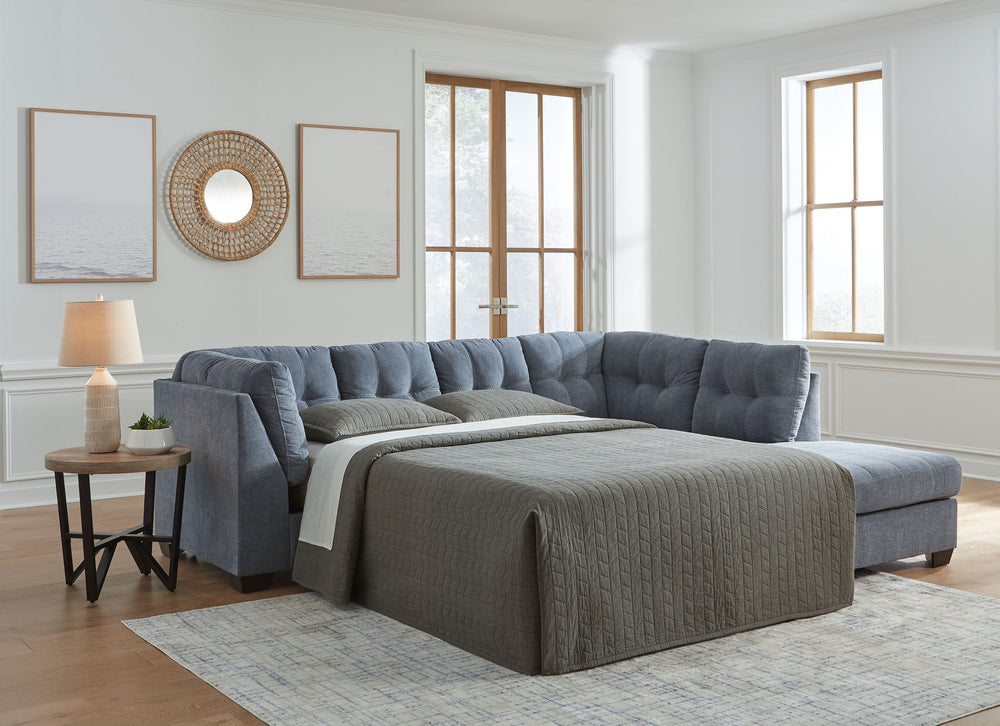This sleeper sectional with chaise takes a homey approach to high style. Its denim-inspired fabric has classic versatility, while a contemporary silhouette and stitched details keep the look totally on trend. And you can count on comfortâ€”the included fu