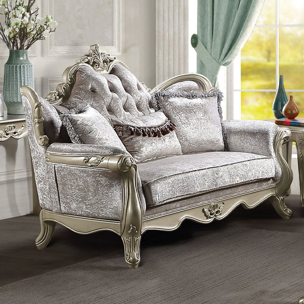 The Libertee collection sofa set is a blend of classic elegance and modern comfort. Finished in champagne, this set features a KD back, legs, and armrests with a wooden inner frame. The tight back and loose seat cushions, constructed with pocket coils, en