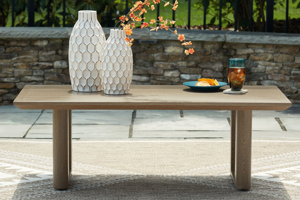 Elevate the appeal of easy-breezy living with this outdoor coffee table. Made to look like wood yet durable enough to weather the elements, it-'s sure to serve you and your besties well, year after year. This table-'s cool character is made for warm memor