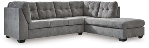 This sleeper sectional with chaise takes a homey approach to high style. Its gray coloration has classic versatility, while a contemporary silhouette and stitched details keep the look totally on trend. And you can count on comfortâ€”the included full mat