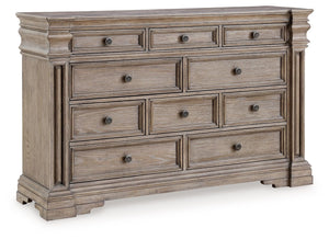 Discover something exceptional with this dresser. Its impressive silhouette offers a casual traditional aesthetic, embodied by classic-inspired columns and a relaxed grayish brown finish. Inset framed drawers of various sizes are casually cool and packed 