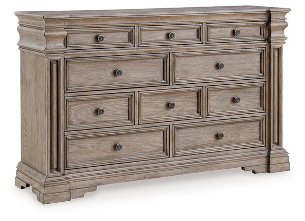 Discover something exceptional with this dresser. Its impressive silhouette offers a casual traditional aesthetic, embodied by classic-inspired columns and a relaxed grayish brown finish. Inset framed drawers of various sizes are casually cool and packed 