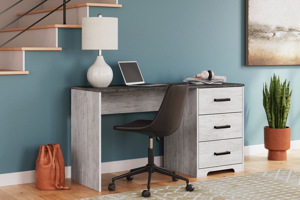 Add an air of quaint productivity to your work-from-home or schoolwork setup. This home office desk fits right in with modern farmhouse aesthetics. Design highlights include a two-tone finish and warm pewter-tone hardware. Looking to bring delightful home