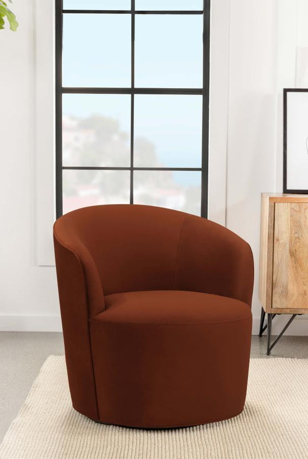  this contemporary burnt orange swivel chair makes itself at home in mid-century modern living rooms and retro-inspired spaces. Upholstered in a warm