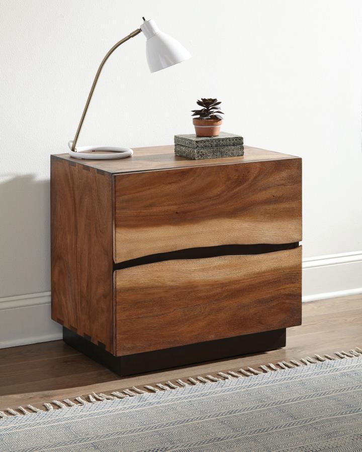 Update your personal space with the intriguing style of this wooden nightstand. Its frame sits atop a sturdy base with an attractive, dark finish. Its body and surface boast a striking smokey walnut and coffee bean finish. One edge of each drawer is craft