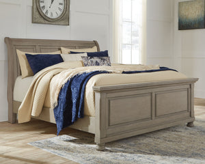  this queen sleigh bed sports serene sophistication. Forever classic design details like inset panels and bun feet are so easy to love. A burnished light gray finish elevates the look with modern sensibility