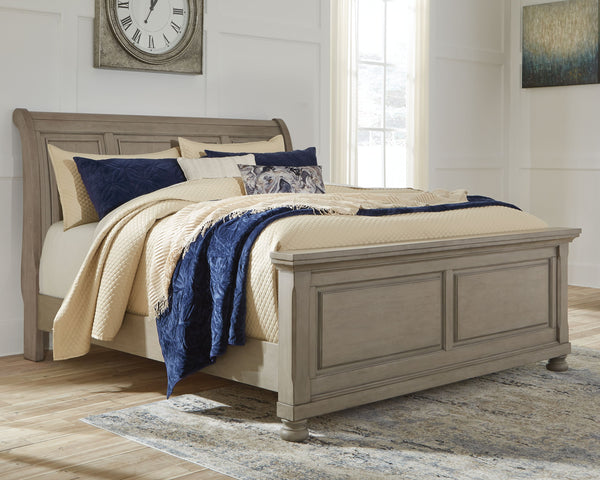  this queen sleigh bed sports serene sophistication. Forever classic design details like inset panels and bun feet are so easy to love. A burnished light gray finish elevates the look with modern sensibility