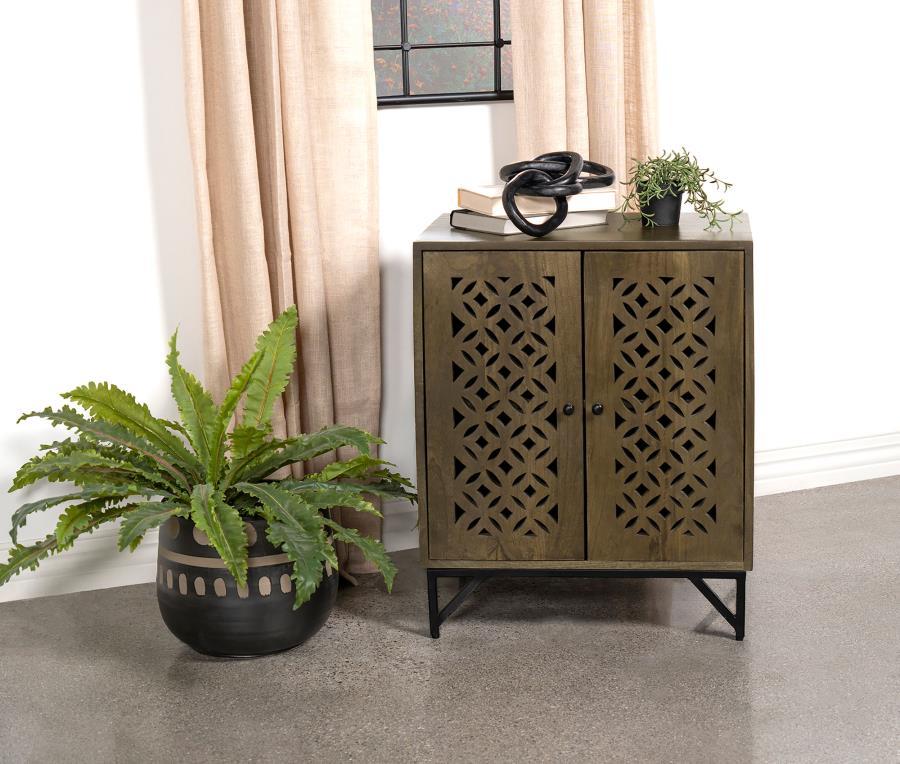 Decorative cutout designs on front doors embellish the artisan motif of this transitional accent cabinet. Versatile style and a spacious interior sets up a perfect well-rounded venue for your space, making a de-clutter effort easy. Brown finish mango wood