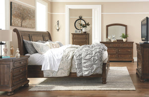 Made with Acacia veneers/engineered board and hardwood solids with a tobacco brown finish. Framed drawers feature fully finished dovetailed drawer boxes, ball bearing side glides and round metal knobs in an aged brass color finish. Dresser features a hidd