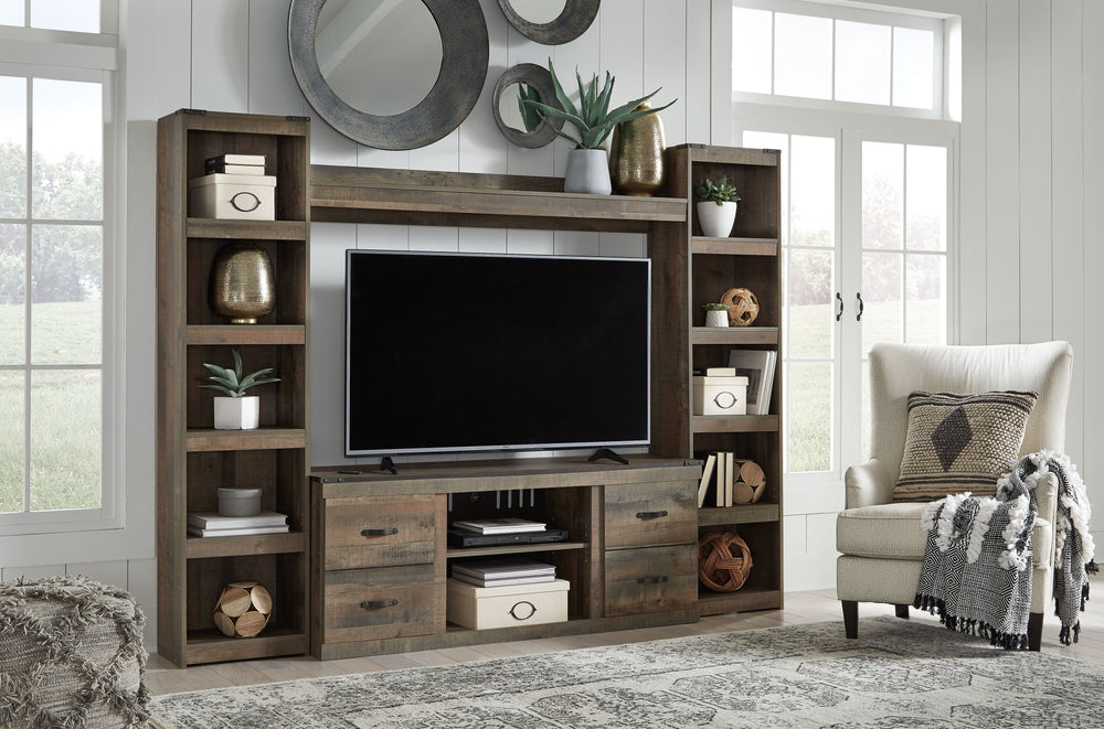 Entertain a rugged yet refined sense of style with this entertainment center. Its rustic finish and plank-style details pay homage to reclaimed barn wood, while metal banding with nailhead accents infuses a touch of industrial cool. Ultra clean lines ensu