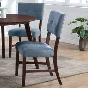 The Tioga Dining Chairs, available in sets of two, bring durable craftsmanship and modern style to your dining space. Each chair is constructed from solid Rubberwood and reinforced with base stretchers, ensuring strong and stable support. With clean lines