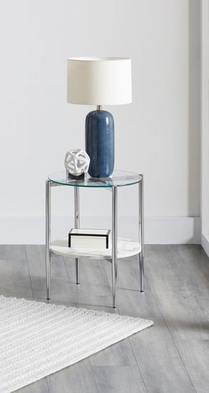  offering functionality and style. The clear tempered glass top provides a sleek surface