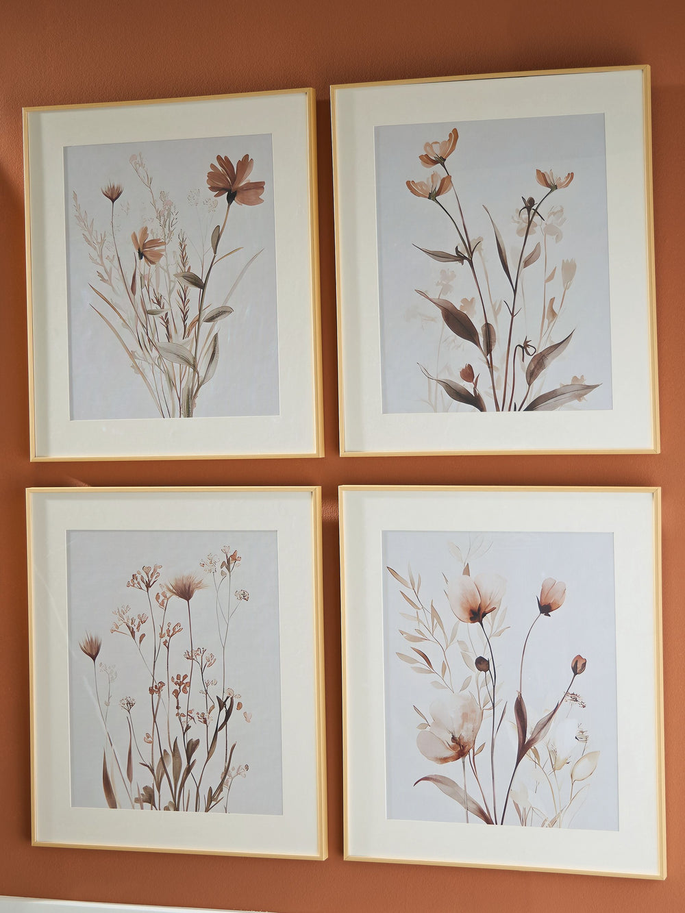 Bask in the beauty of botanical style. This wall art set is well-suited to casual spaces, with each piece featuring a unique floral design in muted beige, gray and blush tones. Hang these framed prints together to make a charming statement.<br/><br/><b>Pr