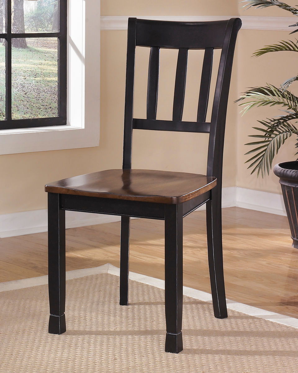 Made with select veneers and hardwood solids in a two-tone finish. Table tops and chair seats are finished in a burnished brown color. The chair frames and table bases are finished in cottage black paint. Glued and screwed corner block construction. <h4><