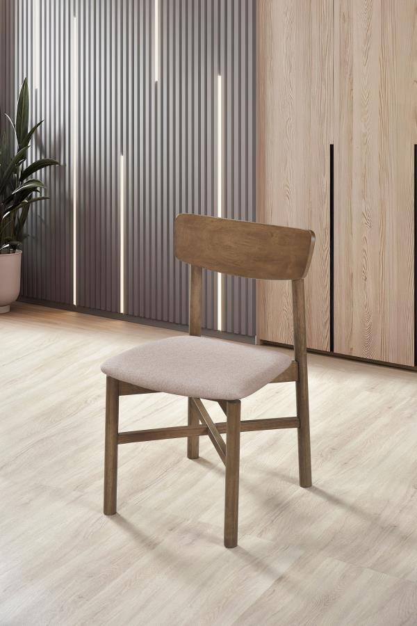  the chair is crafted from a mix of solid wood and engineered wood for both durability and a natural aesthetic. The tan fabric upholste