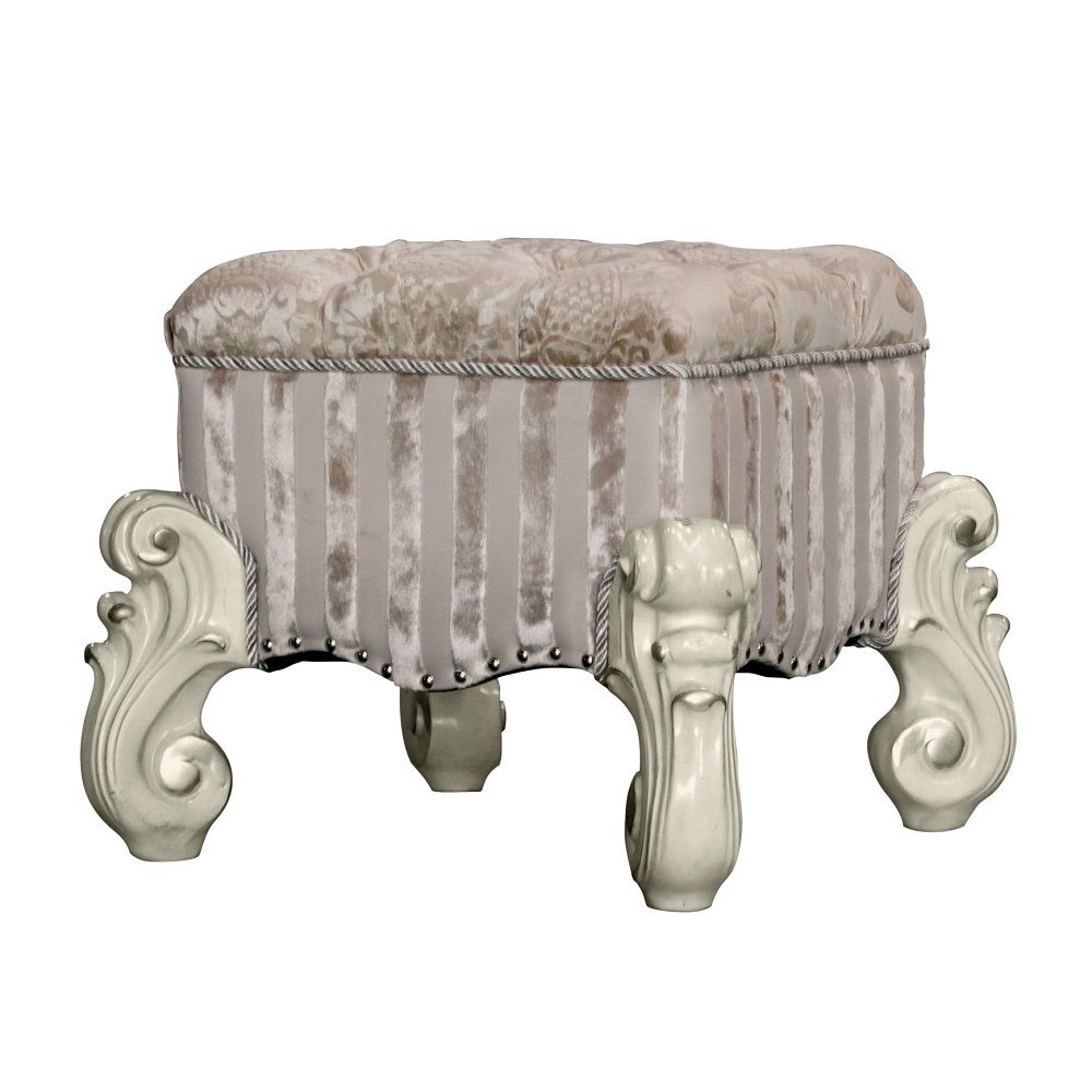 The Versailles vanity stool is the perfect accent to create the style of royalty your bedroom has been needing. This vanity stool crafted in wood with bone white finish was inspired by old European design with an upholstered tight seat cushion with welted