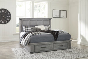 With its light weathered gray coloration, this storage bed conveys trend-right urban farmhouse style. Thick-profiled top moulding on the tall, mansion-scale headboard lends a fresh take on a timeless design. The footboard features two storage drawers with