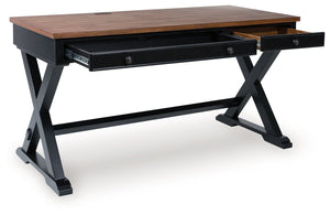  which pairs a warm satin black base with a contrasting butcher block veneer desktop. The drop-down keyboard and cord manageme