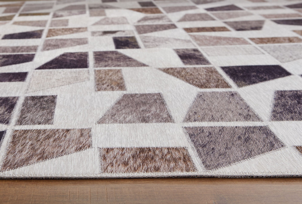 Bring a sense of warmth and comfort, with a modern flair, to any room. With its geometric design, this area rug makes a statement with clean lines and rich texture. It will elevate your living space from nice to spectacular.<br/><br/><b>Product Features</