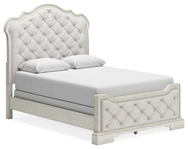 Add a touch of romance to your home with this queen upholstered bed. The antiqued white painted finish and serpentine-shaped silhouette details are the picture of easy elegance. Indulge your love of luxury with decadent button-tufted cushioning from head 