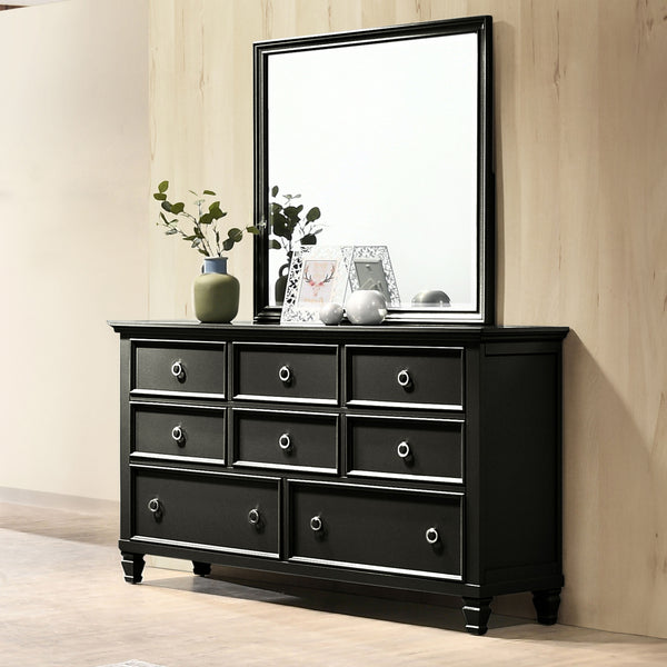 The Tamarack 8 Drawer Dresser and Mirror in Black is a perfect blend of durability and elegance. Crafted with a combination of solid poplar, basswood veneers, and eco-friendly manufactured wood, this set ensures strength and long-lasting durability. Its v