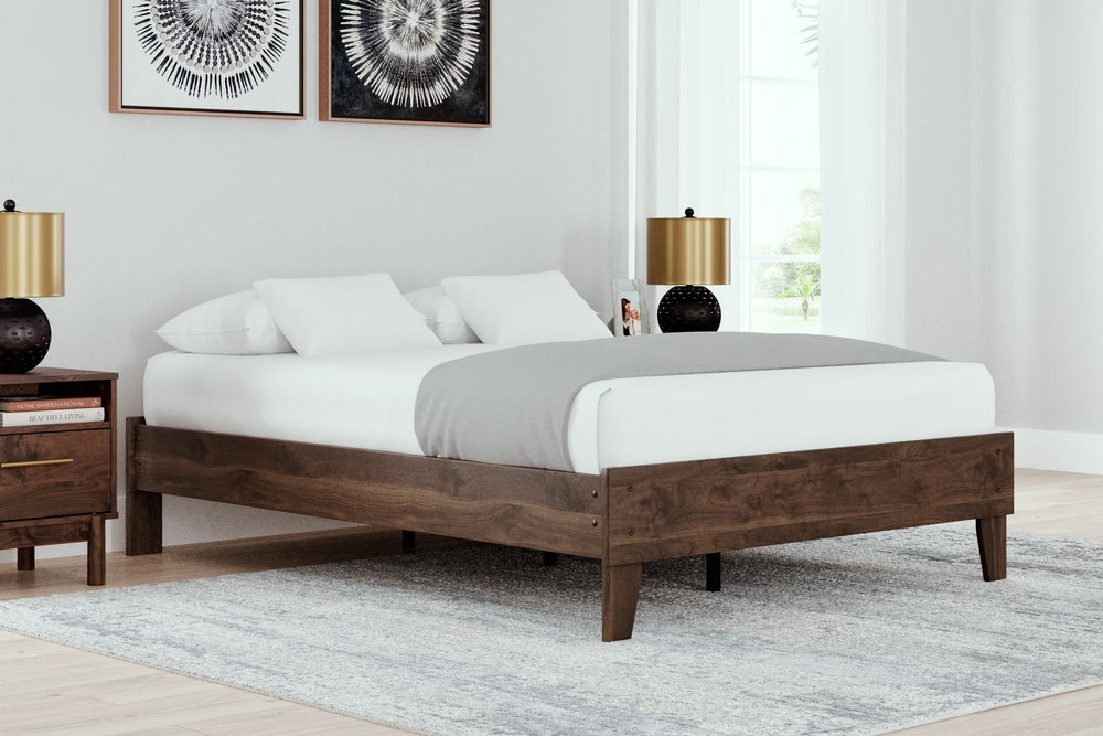 At the intersection of classic cool and chic sophistication youâ€™ll find this full platform bed. The rich brown finish over replicated walnut wood grain offers an authentic touch that plays well any way you style it. Minimal yet elegant in its design, th