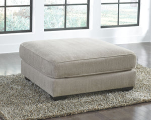  this oversized accent ottoman is worthy of taking center stage. Its textural chenille upholstery is pure delight