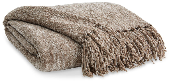 A lovely layer to cozy up with, this taupe throw blanket also makes a stylish statement. Whether draped over the arm of a sofa or folded at the foot of a bed, the woven texture and knotted fringe give it a homespun look that-'s relaxed and inviting.<br/><