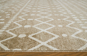  this area rug showcases an eclectic mix of unique motifs in neutral hues. Its low pile height makes it ideal for high-traffic spaces. This area rug is machine washable for fuss-free cleaning.<br/><br/><b>Product Featur